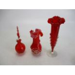 Selection of ruby glass to include vases and decanter