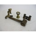 Collection of brass ware to include pig statue tap, solid brass hammer and binoculars.