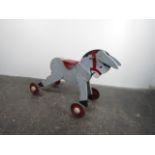 Vintage ride on movement horse. H58 x L68 x W40cms.