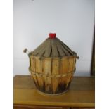 Large vintage French carboy in woven cover 55cm high