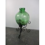 Vintage glass carboy and stand. H61 x W35.