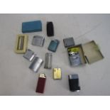 Collection of vintage lighters to include a Ronson Cadet and some boxed lighters