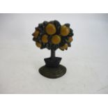 Cast iron fruit tree door stop.