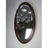 Vintage oval mirror inlaid frame 82 x 53cms.