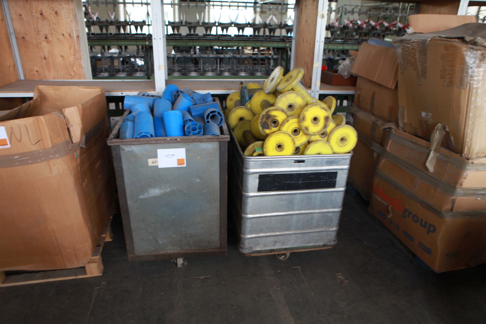 2 Tubs of textile machine plastic tubes and reels