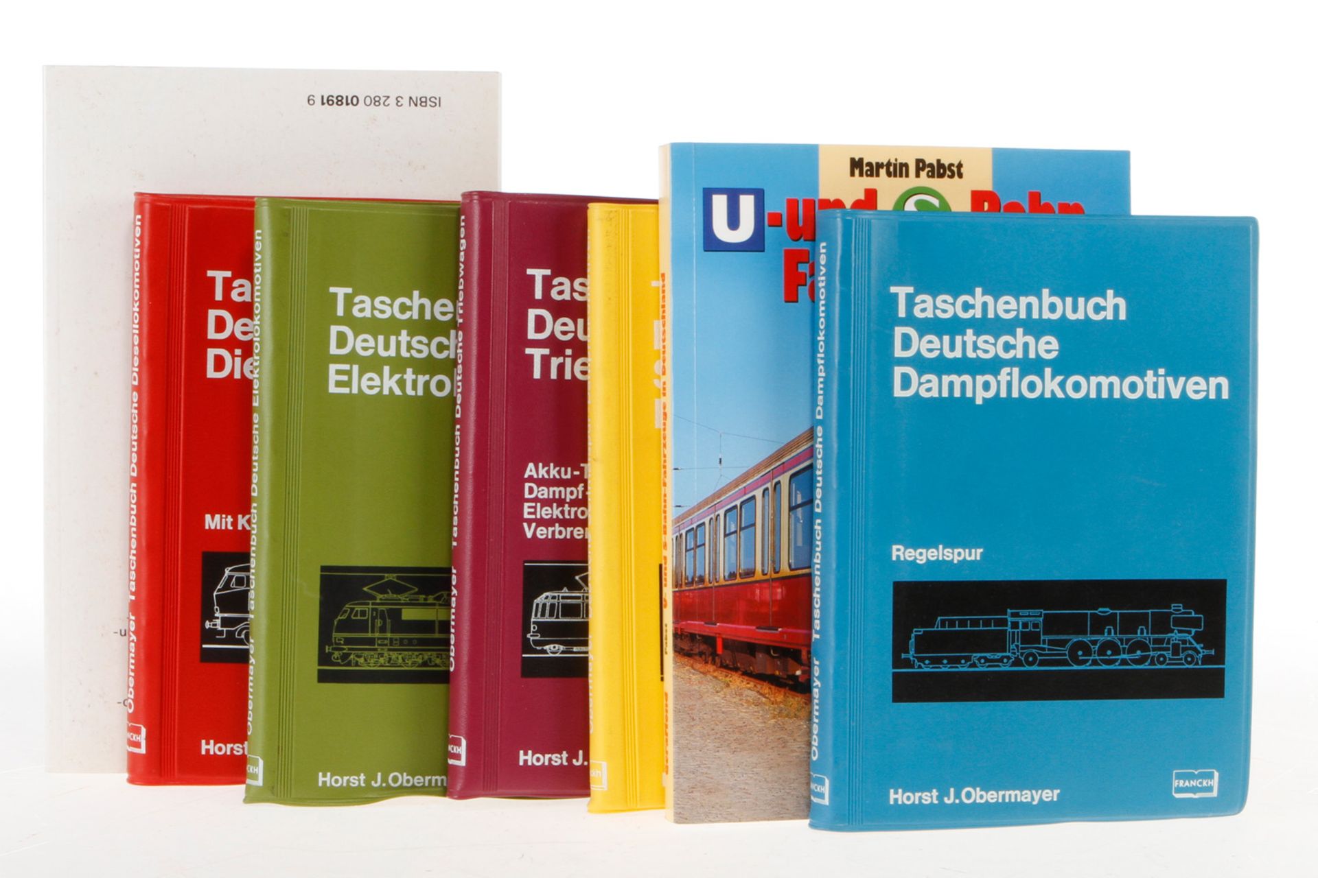 7 Eisenbahn-Bücher, daunter “Taschenbuch deutsche Dampflokomotiven“, “Taschenbuch deutsche