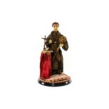 Wachsfigur des hl. Leonhard von Limoges, um 1900, mit Glassturz, kleine Fehlstelle am Gewand,