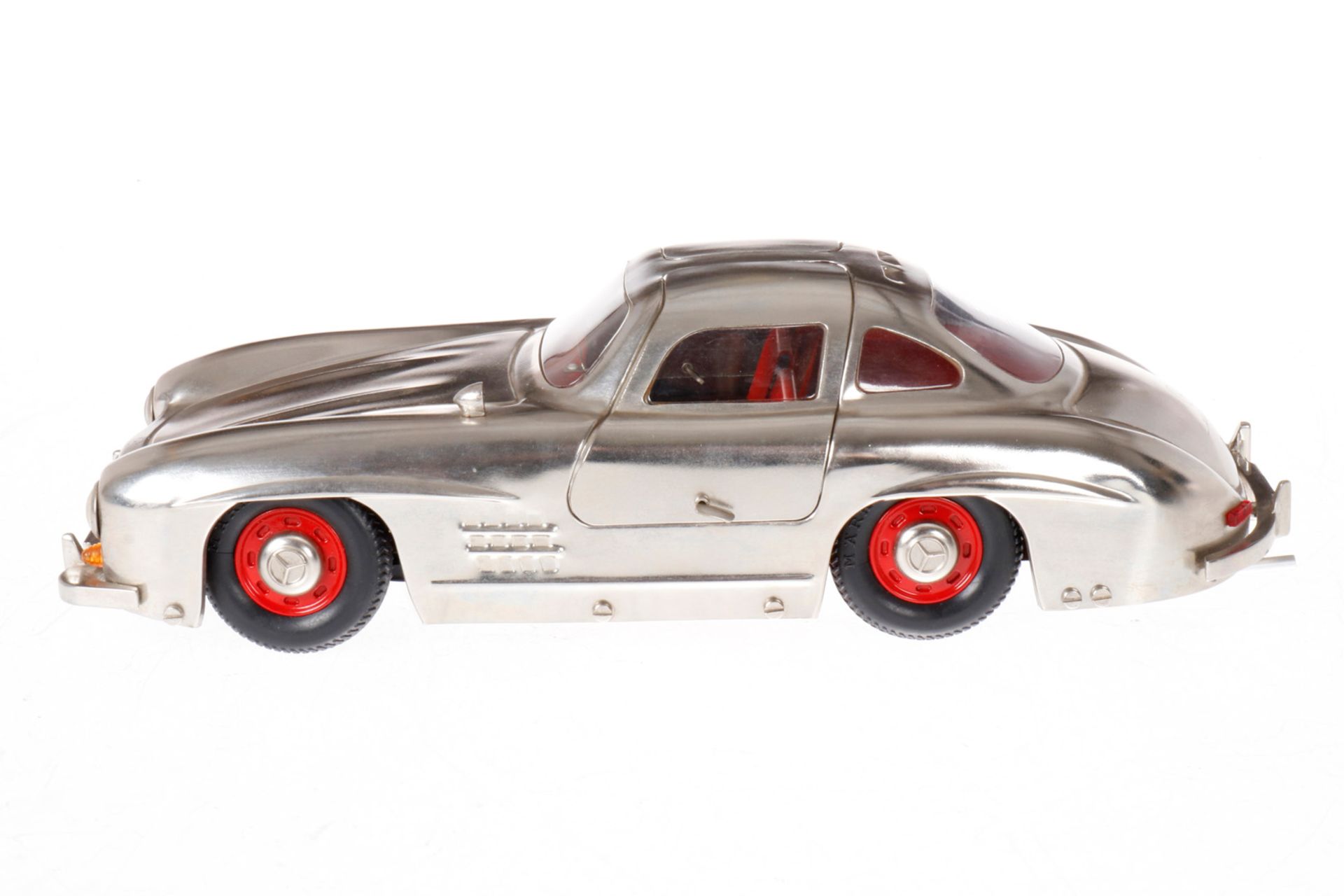 Märklin Mercedes 1952, glanzvernickelt, mit Schlüssel, Alterungsspuren, L 34, im besch. OK 1092 (mit