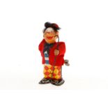 Y Clown mit Hut und Stock, Japan, Blech/Kunststoff, Uhrwerk intakt, LS und Alterungsspuren, H 15,