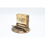 Brass cigarette dispenser and ashtray, Brust Harig MFG Chicago