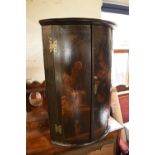 George II black lacquered cylinder corner cupboard with painted chinoiserie decoration