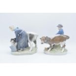 Royal Copenhagen figures of Girl with Calf 779 and Boy with Calf 772 (2)