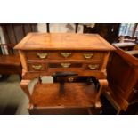 George II walnut lowboy with herringbone stringing and quartered veneers on later cabriole legs