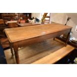 Late Victorian oak kitchen table with boarded top with lobed apron piece turned legs with folding si