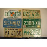 6 vintage American vehicle number plates