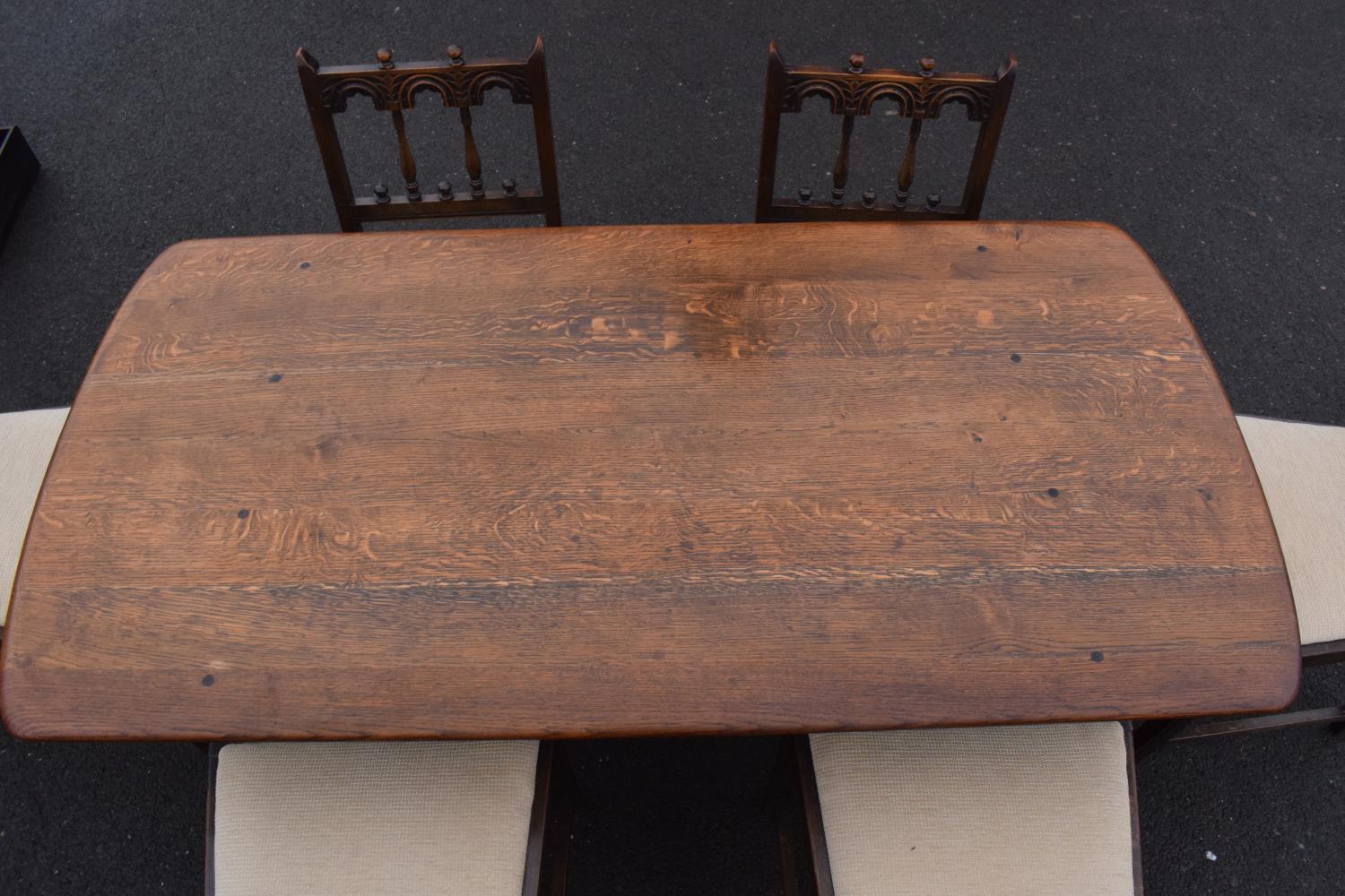 Ercol elm dining table together with 6 matching chairs in a colonial style. Generally in good - Image 3 of 10