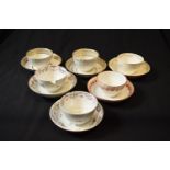 A collection of 19th century tea cups and saucers made by various English potter mainly in the style