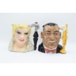 Large Royal Doulton character jugs Mae West D6688 and Louis Armstrong D6707 (2) All in good