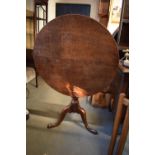 Victorian oak circular drop leaf table. One plank has been reglued on the top. Repair to the block