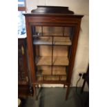 Edwardian inlaid mahogany and glass display cabinet. In good functional condition with signs of wear