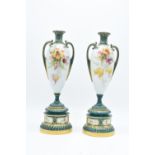 Royal Worcester pair of twin-handled floral vases 1957 (unsigned) (27cm tall) One has been