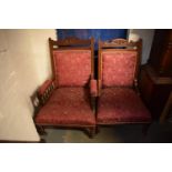 Edwardian creed and upholstered mahogany His and Hers chairs. The springs in the seats are fairly