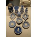A collection of blue Wedgwood Jasperware to include dip blue jug, lavender holder etc (11 pieces)