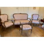 A Louis XVI style four piece salon suite, 20th century, with pink and cream upholstery (4) In good