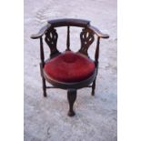 Late Victorian upholstered corner chair. The item is in good structural condition but could do