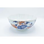 Large 19th century oriental bowl with floral decoration: with extensive damage. There are