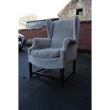 George III style wingback mahogany arm chair. In good condition with age related wear as expected.
