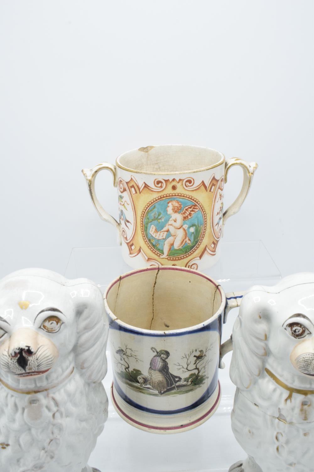 19th century Staffordshire pottery to include a pair of dogs, a shepherd mug and a 2 handled - Image 2 of 3