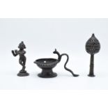 A collection of antique Oriental/ Asian bronze items to include a lamp, a figure of a goddess and an