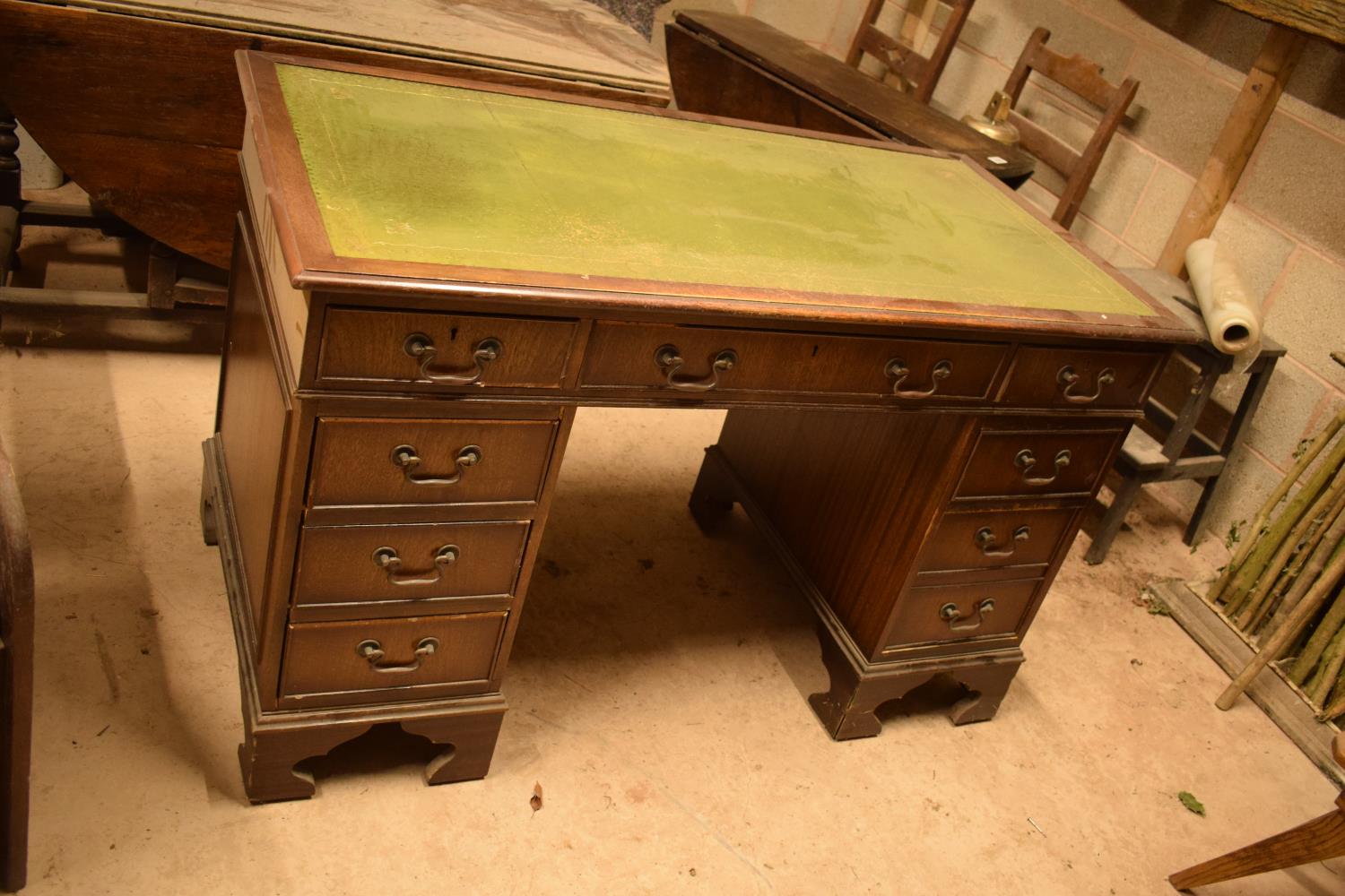 Reproduction wooden desk with leather insert. In need of attention. A bit tatty with cracks to