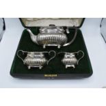 Silver 3 piece tea set to include the teapot, milk and sugar: hallmarked for London 1905 (1120 grams
