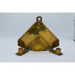 Arts and Crafts brass candle sconce. 20cm wide. In good condition although is showing signs of age