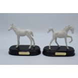 Royal Doulton horses on plinths Springtime and Adventure (2) The item appears to be in good