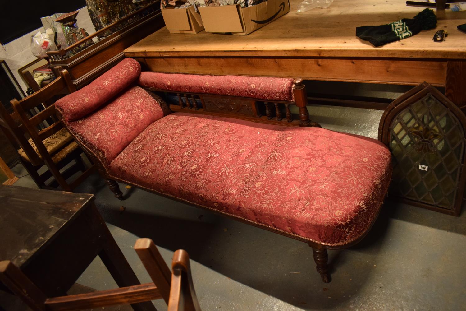 Edwardian upholstered mahogany chaise-longue. The springs have gone spongey. Damage to the carving