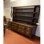 Georgian large oak dresser with spice drawers: 4 draws wide. All original brass handles. Some damage