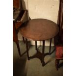 Georgian circular oak side/ occasional table. Damage to one part of the edge and other scuffs too.