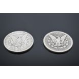 2 USA silver one dollar coins: 1886/1896. The 1896 coin is fairly rubbed and has lost definition