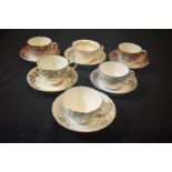 A collection of 19th century tea cups and saucers made by various English potter mainly in the style