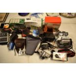 A mixed collection of cameras and accessories to include Kodak, Canon, JVC etc Condition is mixed.