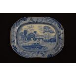 Early 19th century blue and white Clews charger with a castle pattern. There is a chip on the item