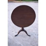 Early 20th century oak circular tilt top tripod table, potentially the top is newer than the base.