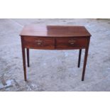 Edwardian mahogany side table woth 2 drawers. In good condition with some water stains, signs of old