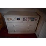 20th century painted pine chest of drawers. With signs of use and wear in a family home.Stickers are