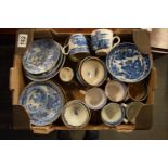 A collection of English 19th century blue and white pottery to include cups, tea bowls, plates