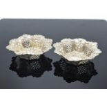 A pair of small silver sweet dishes, hallmarked for Birmingham 1897 (37.2 grams). Generally in