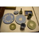 A collection of Wedgwood Jasperware including a framed dip blue lid, plates vases etc (9)